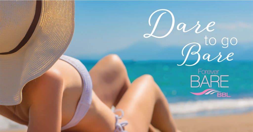 Woman relaxing on a sunny beach with smooth, glowing skin