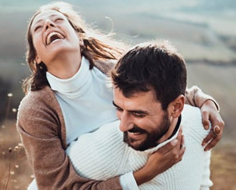 Happy man and woman together after hormone optimization treatment